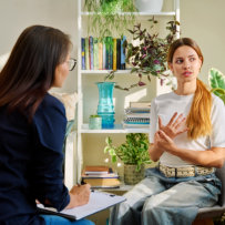 psychologist evaluating teen patient