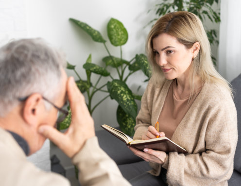 woman evaluating patient