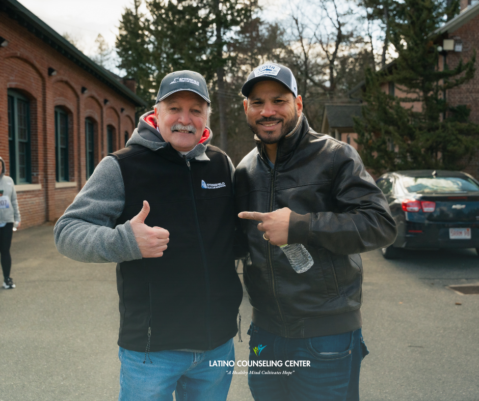 two people smiling