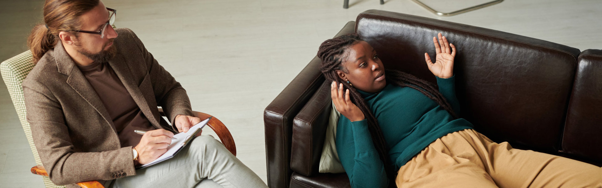 Woman Lying on Couch Talking with Therapist